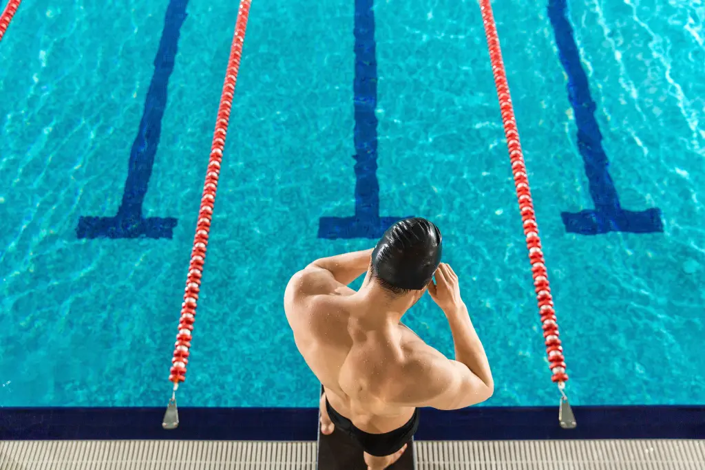 rear-view-of-a-man-preparing-swimming-goggles.jpg rear-view-of-a-man-preparing-swimming-goggles.jpg